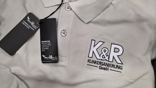 Szara koszulka polo z haftowanym logo K&R Klinkersanierung